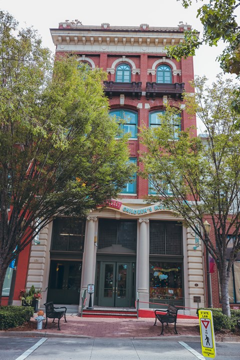 a building with two benches in front of it