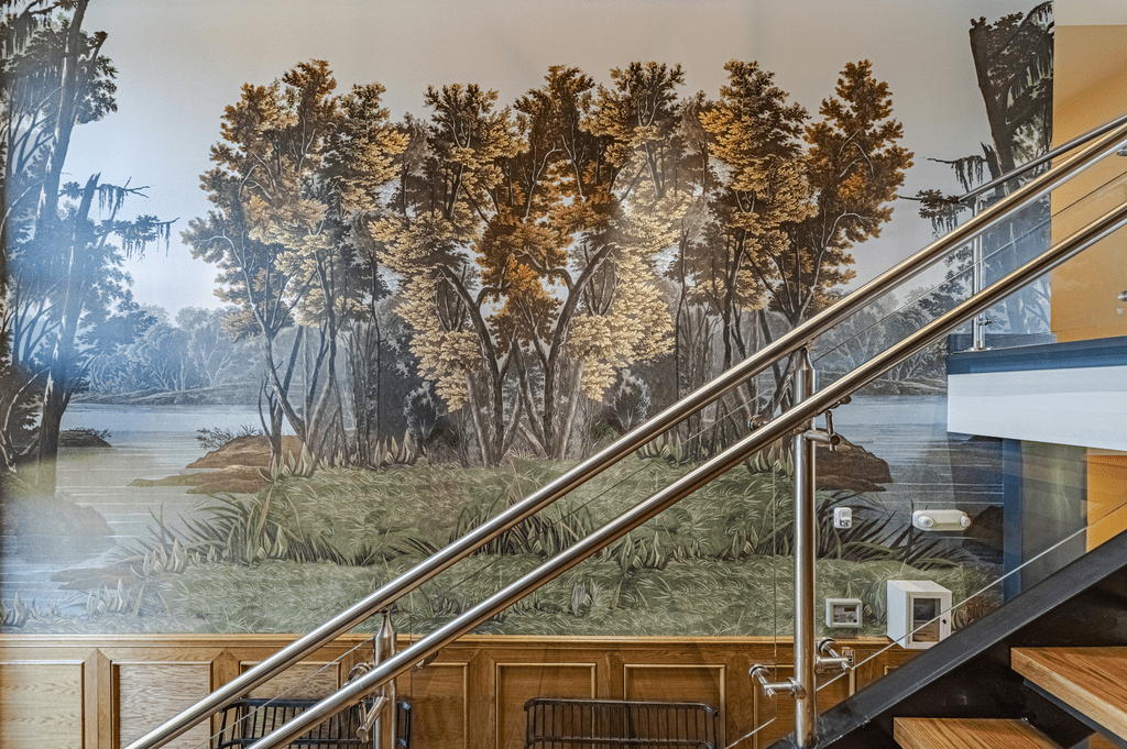a painting of a forest on the wall of a building at The Fitzgerald, Spartanburg, South Carolina