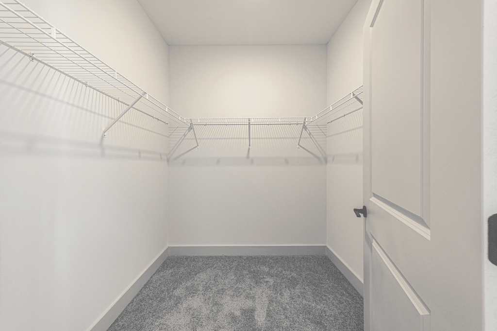 a spacious walk in closet in a 555 waverly unit at The Fitzgerald, Spartanburg, South Carolina