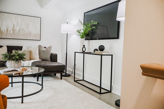 a living room with a couch and a television