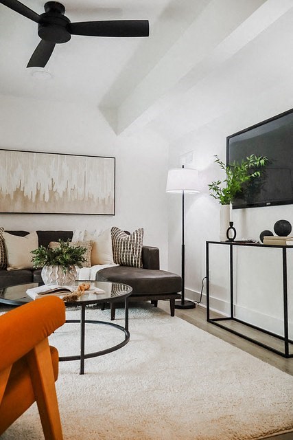 a living room with a couch and a table