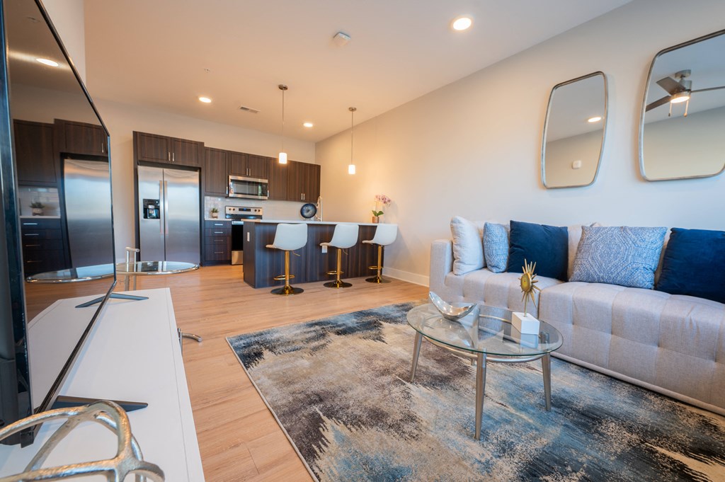 a living room with a couch and a table at Park View Greer, Greer, SC