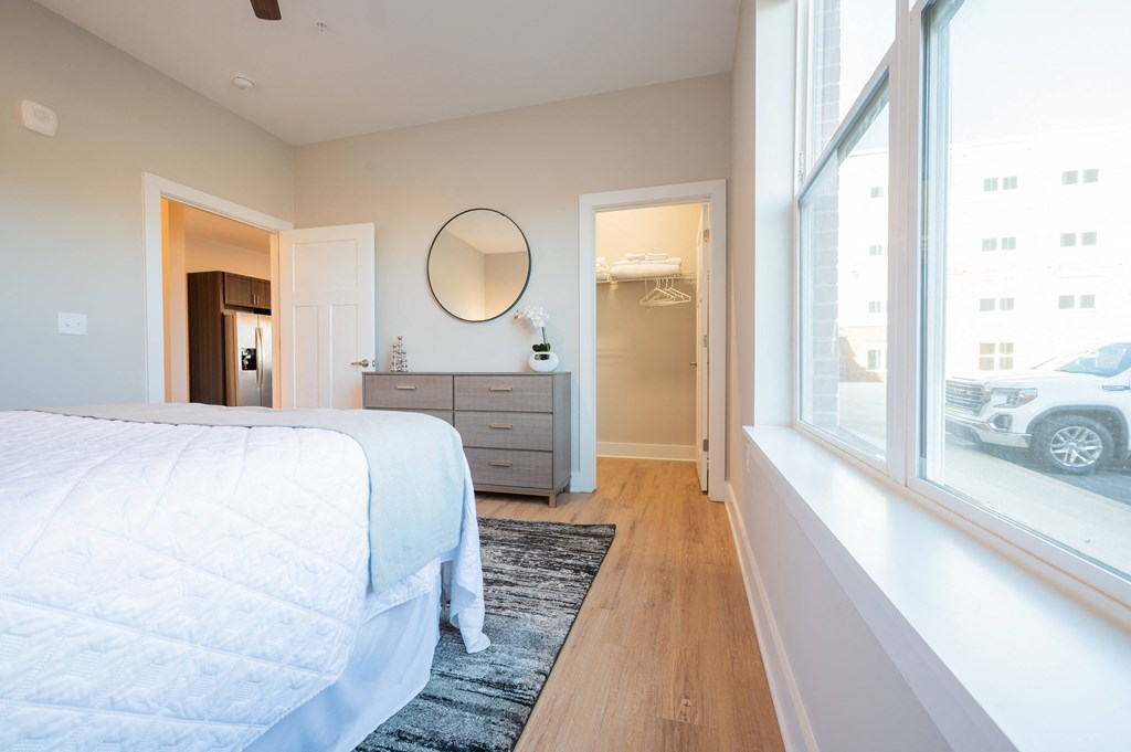 a bedroom with a bed and a large window at Park View Greer, Greer, South Carolina