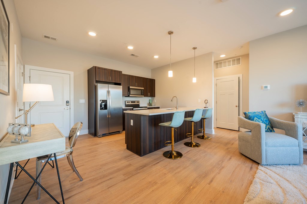 a living room with a kitchen and a dining room at Park View Greer, Greer, SC, 29365