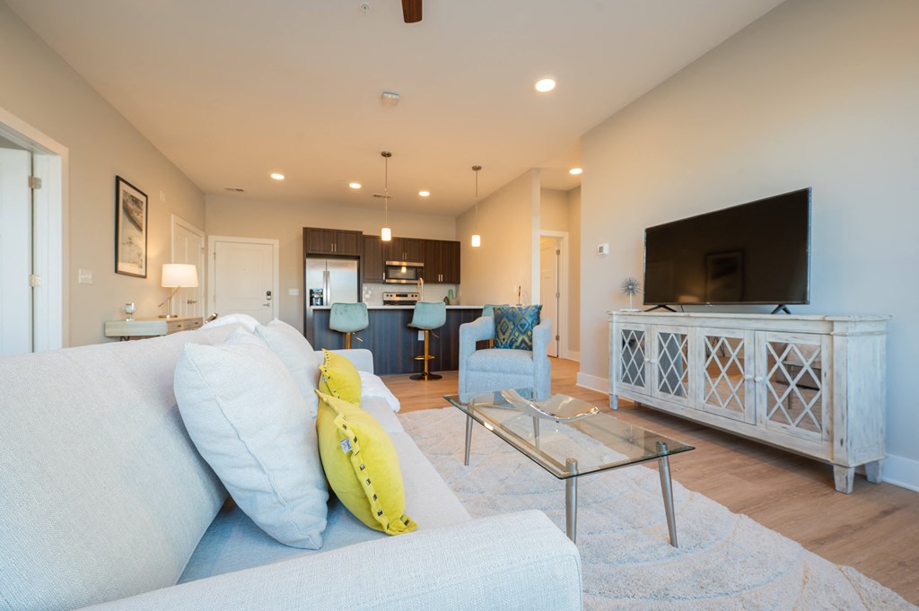 a living room with a couch and a glass coffee table at Park View Greer, South Carolina