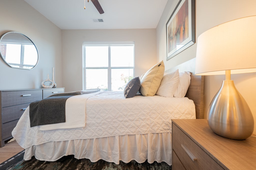 a bedroom with a large bed and a window at Park View Greer, Greer