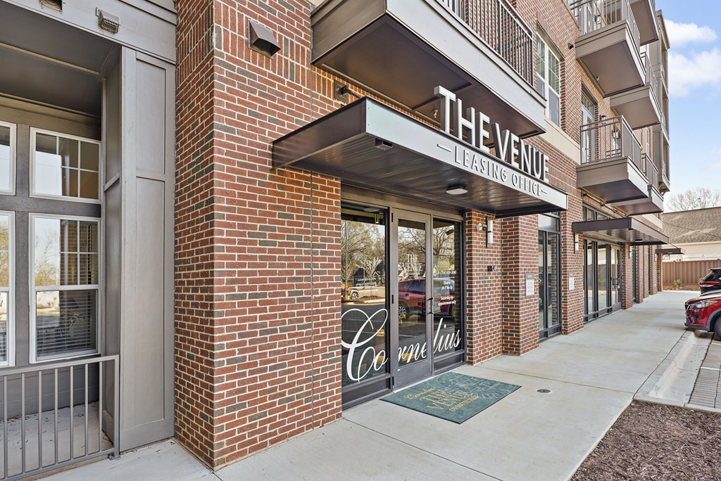 The entrance to a building with a sign that reads "The Venue."