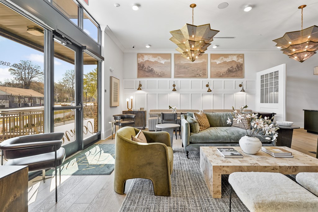 A living room with a green couch and a coffee table.