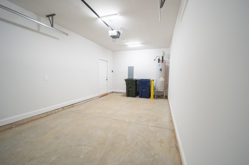 a room with a white wall and a white door at Landon Green Artisan Cottages Apartments, North Carolina, 28601