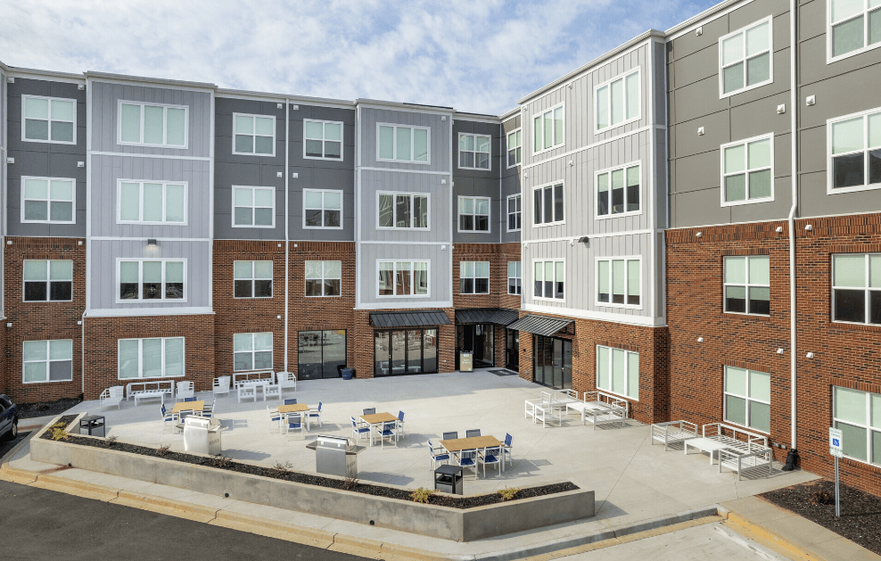 a rendering of an apartment building with a courtyard at Park View Greer, Greer, SC