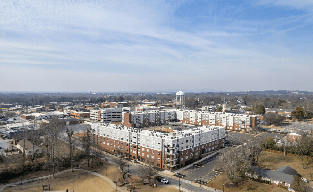 an aerial view of a city with buildings and a glass fence at Park View Greer, Greer, SC, 29365