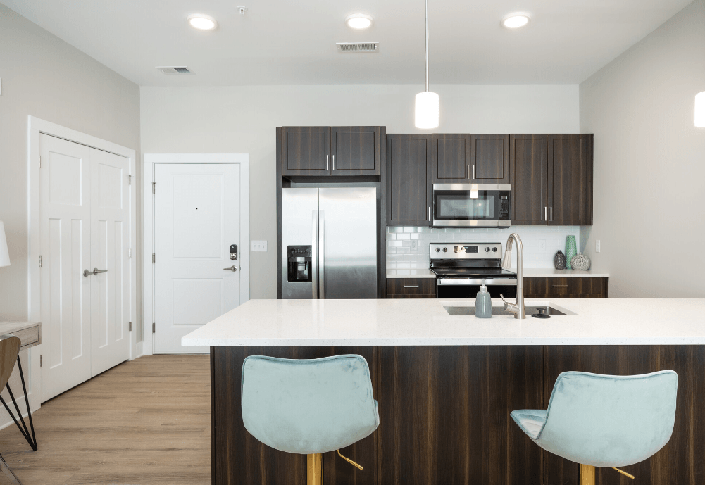 a kitchen with a large island and a stainless steel refrigerator at Park View Greer, Greer, 29365