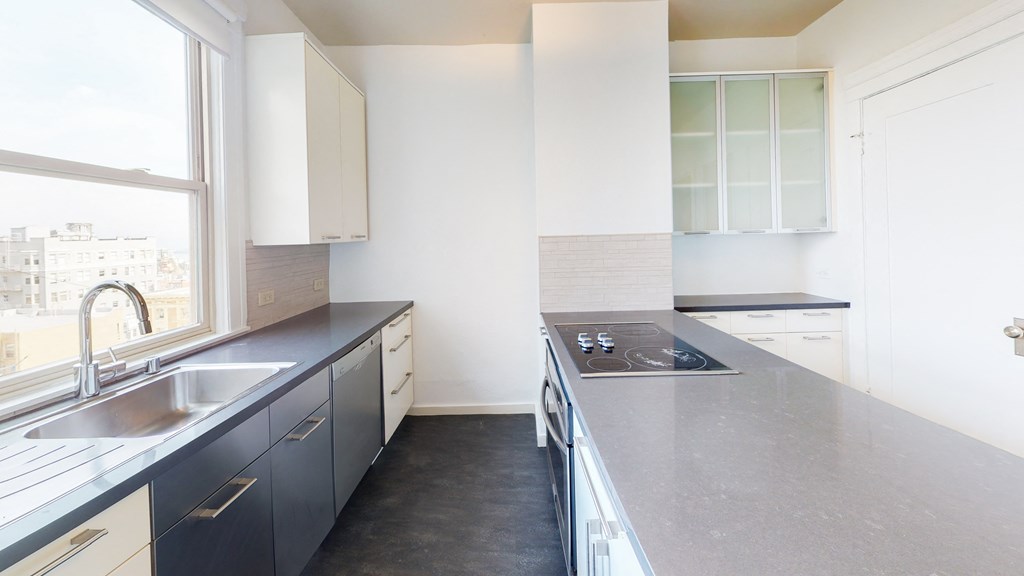 unit photo of the kitchen with upgraded appliances