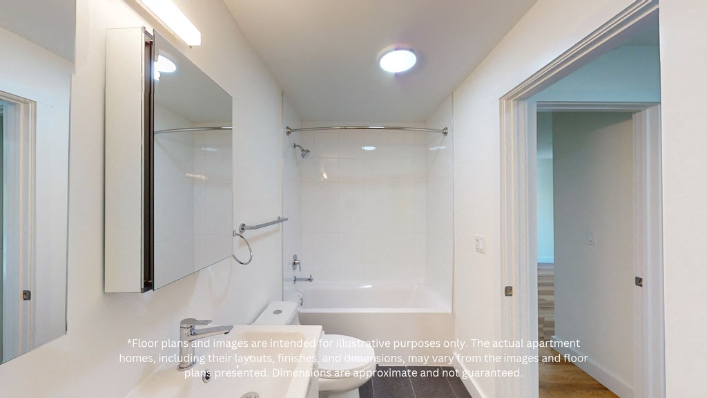 a bathroom with a shower and a sink and a mirror