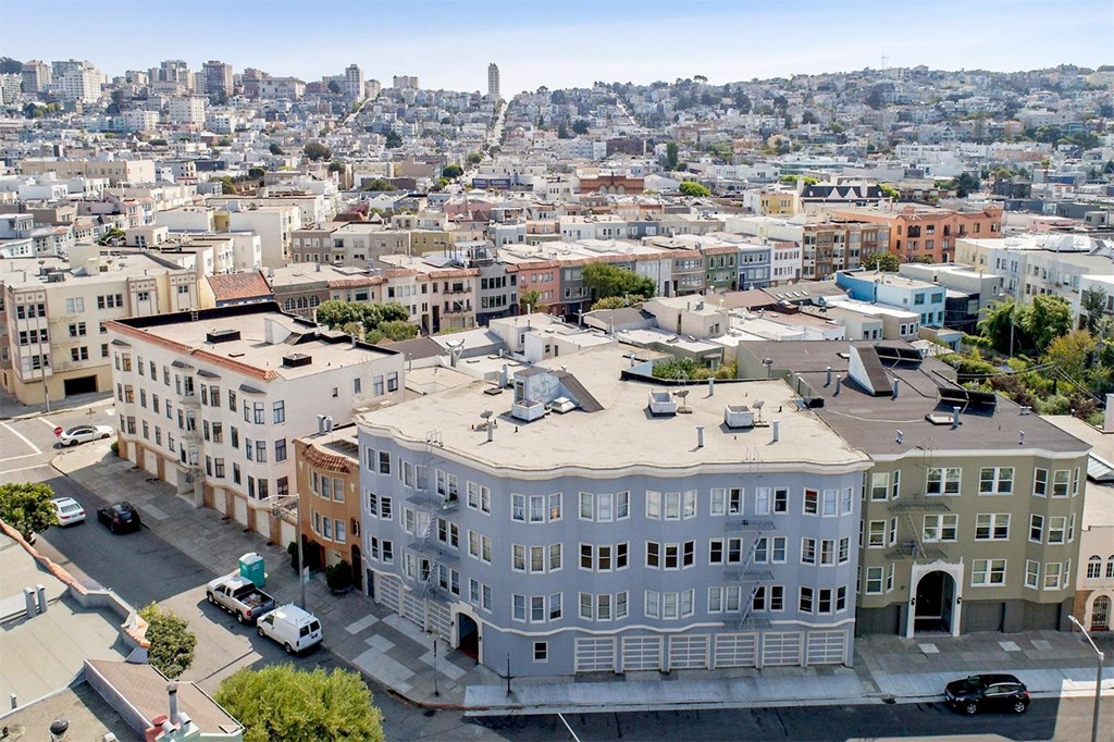 Front exterior view of the apartment building at 225 Mallorca Way, San Francisco, CA 94123, USA