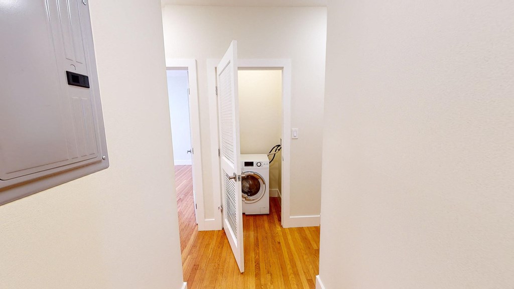 a laundry room with a washer and a dryer in it