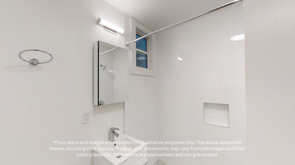 a white bathroom with a mirror and a shower