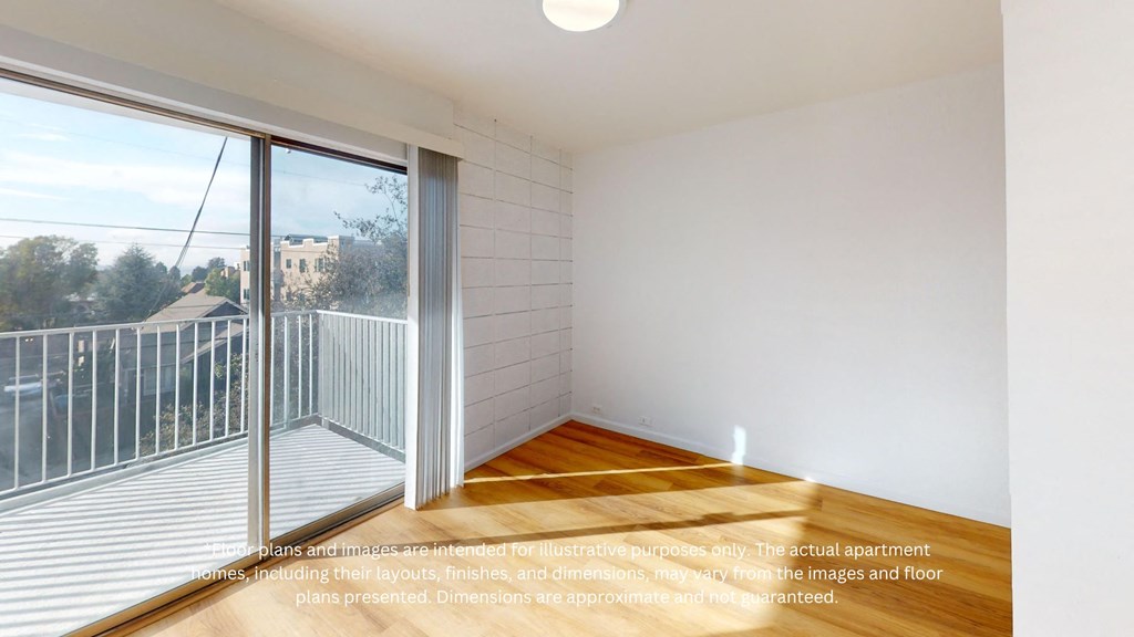 an empty room with a balcony and a sliding glass door