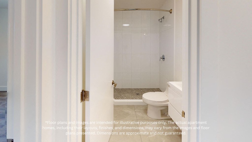 a white bathroom with a toilet and a shower