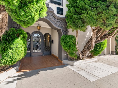 A building entrance with a sign that says "Brick".