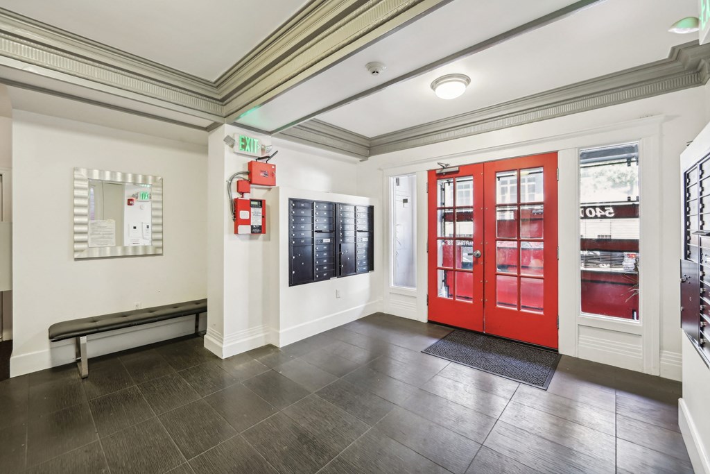 Apartment foyer with stylish decor and mailboxes