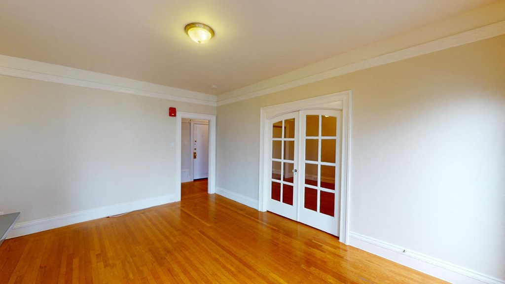 Living area with a wood-like flooring