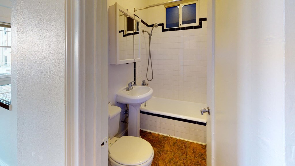 a small bathroom with a toilet and a sink