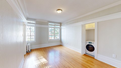 A room with a washing machine in it.
