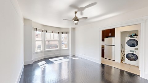 A room with a washer and dryer in it.