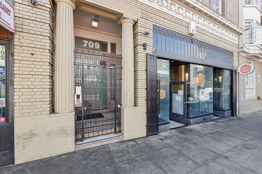 Main entrance door of the apartment building at 709 Geary St, San Francisco, CA 94109, United States