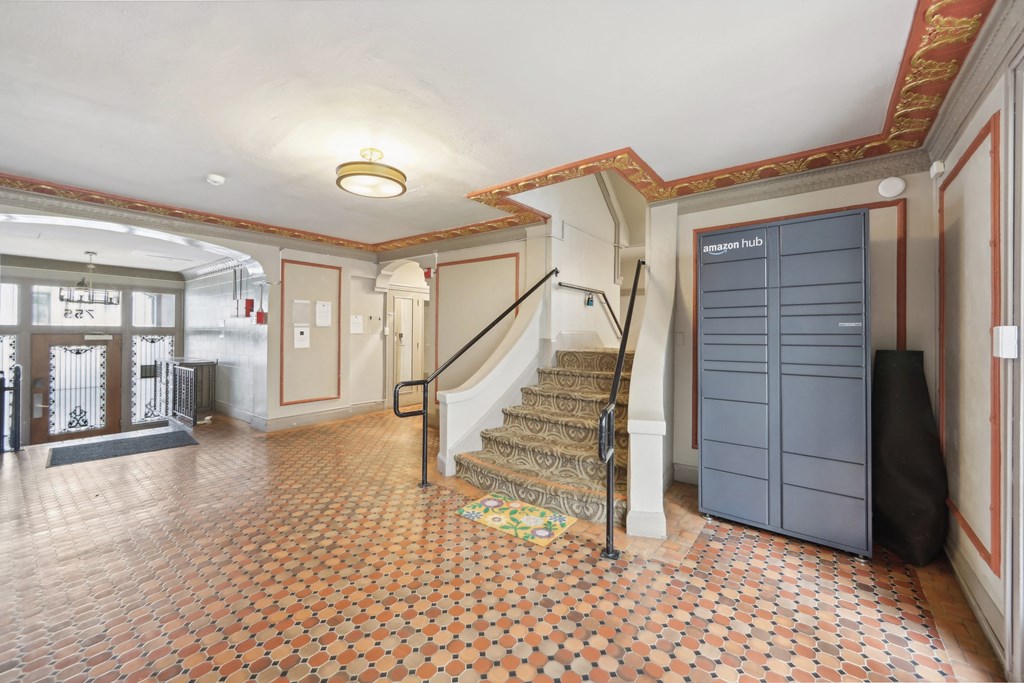 Lobby with a front desk and an Amazon Hub Locker