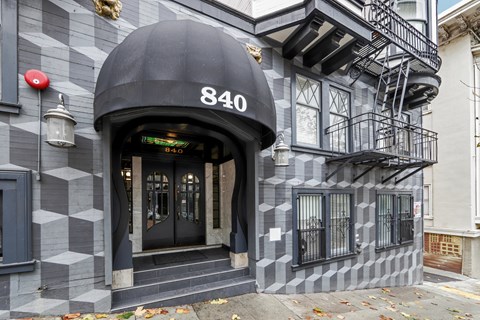 The front of a building with the number 840 on it.