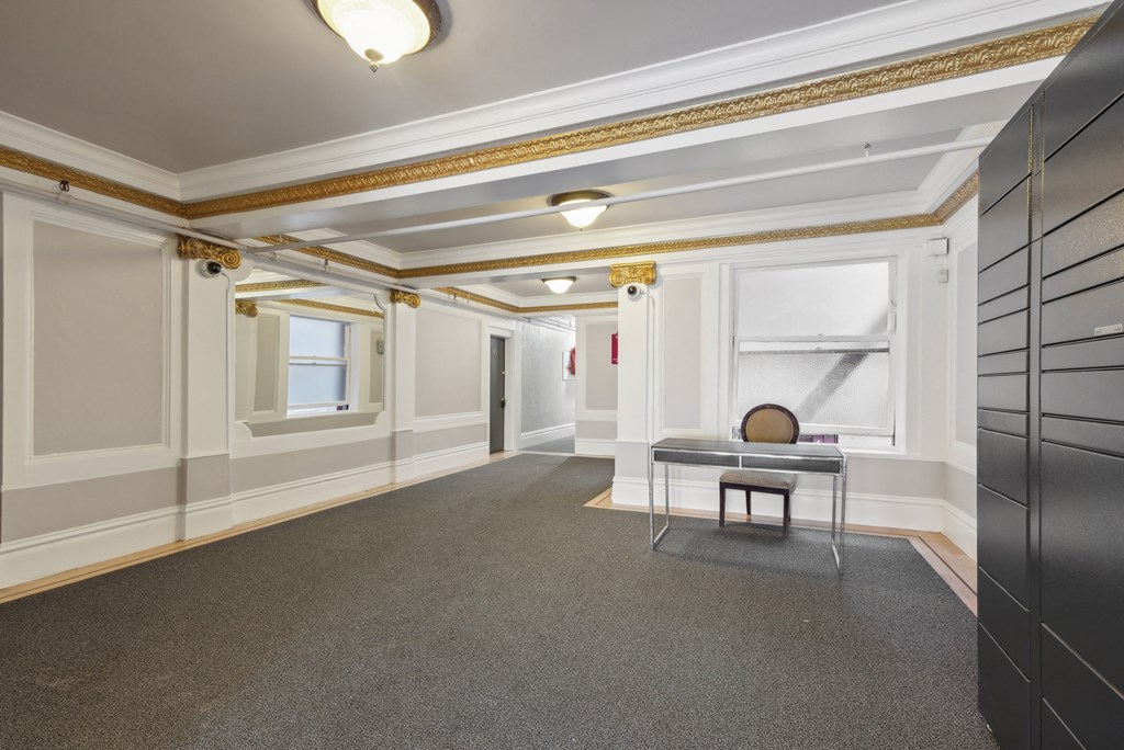 Lobby with a front desk and an Amazon Hub Locker