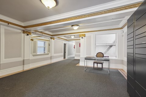 Lobby with a front desk and an Amazon Hub Locker