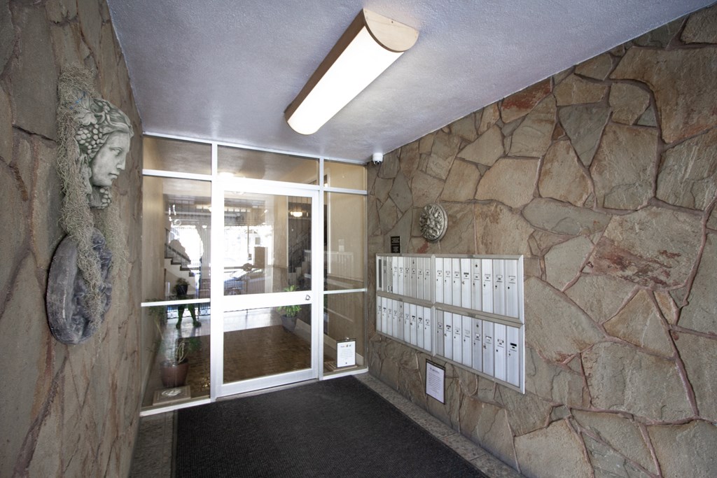 Main entrance door of the apartment building at 1085 S Van Ness Ave, San Francisco, CA 94110, USA
