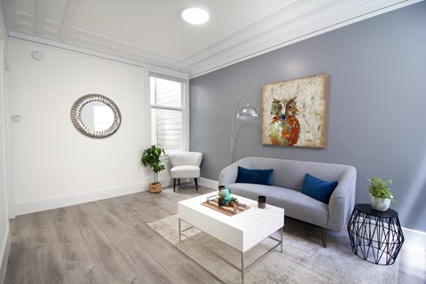 a living room with a couch and a coffee table