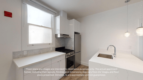 a white kitchen with a sink and a window