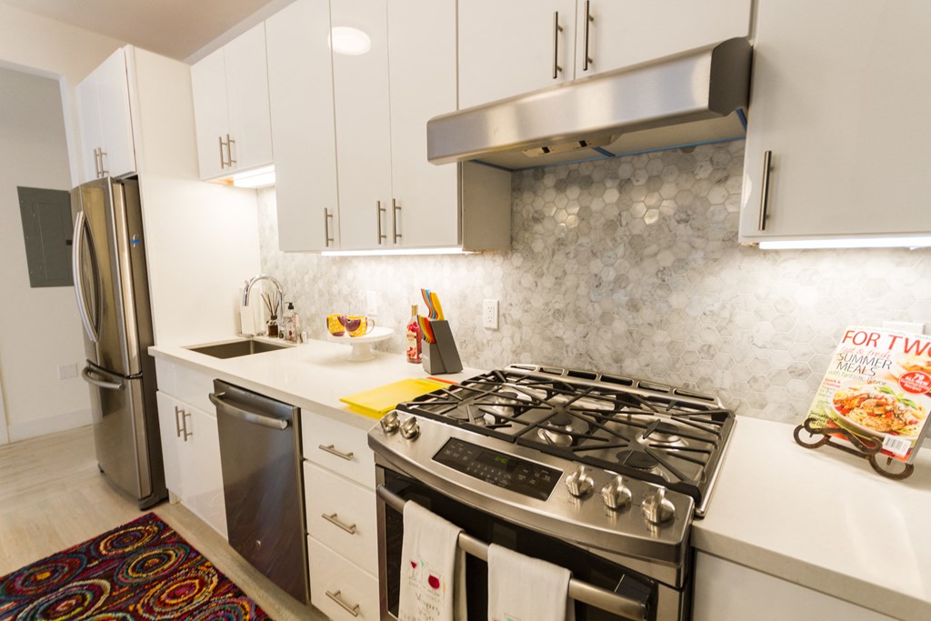 modern kitchen with stainless steel appliances.