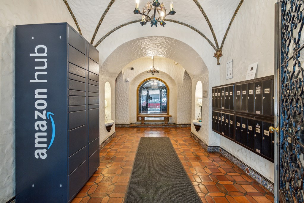 Lobby with a front desk and an Amazon Hub Locker