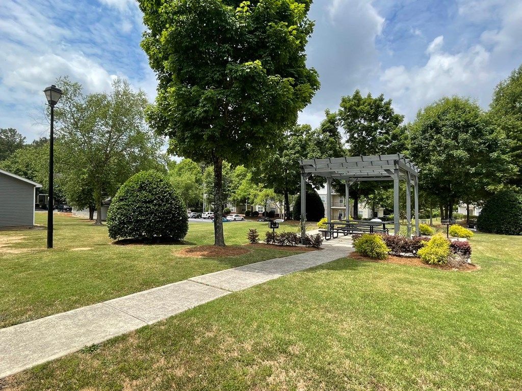 a park with a gazebo and some trees at Hidden Creek, Morrow, GA 30260