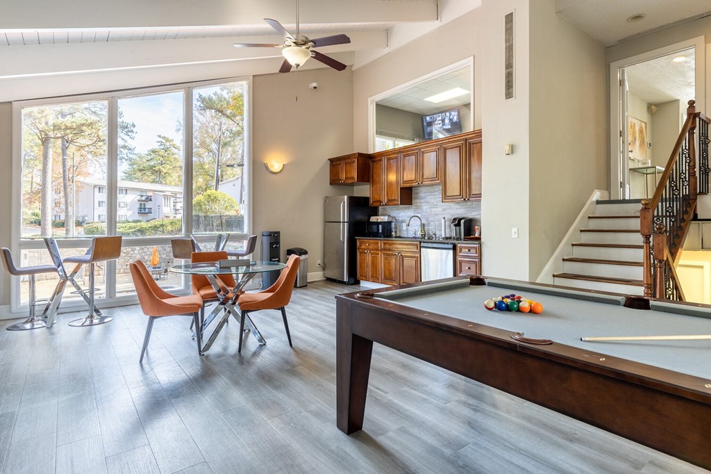Clubhouse with pool table and open spaces at Tucker Square, Georgia