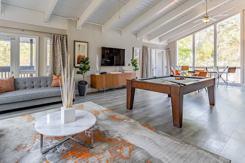 clubhouse with a pool table and a couch at Tucker Square, Stone Mountain, GA