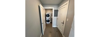 A laundry room with a washer and dryer.