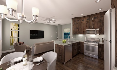 a kitchen and dining room with a table and chairs