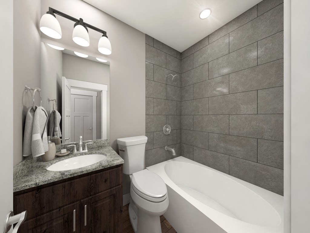Contemporary Bathroom With Tile Details, Sink with Marble Counter, Light Fixtures at Moenave Townhomes in Springdale, Utah