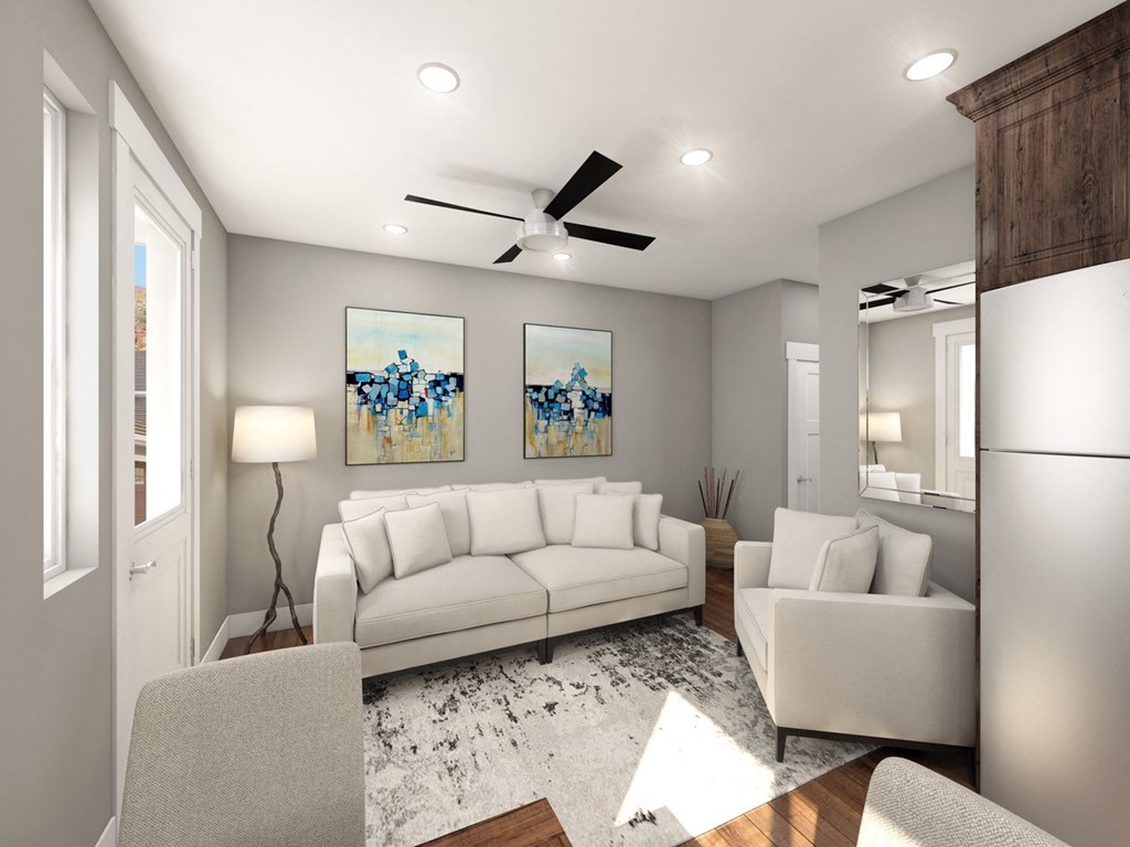 Modern Living Room With Light and Fan Fixture, Hardwood Flooring, at Moenave Townhomes in Springdale, Utah