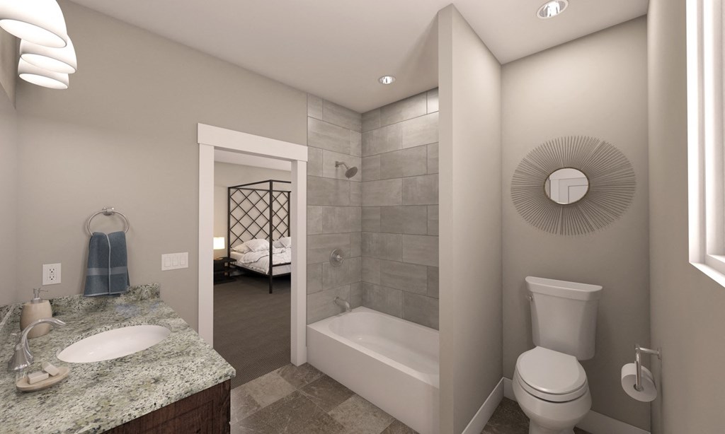 Large Bathroom With Shower, Bathtub, and Tile Flooring at Moenave Townhomes in Springdale, Utah