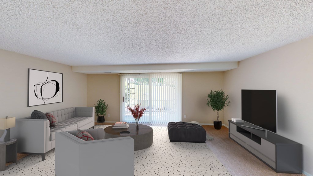 a living room with a couch and a tv