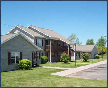 a house with a sidewalk in front of it