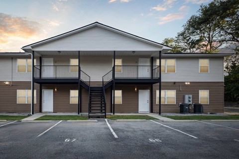 Two story apartment building with exterior stairs at Seasons Apartments, Statesboro, 30458